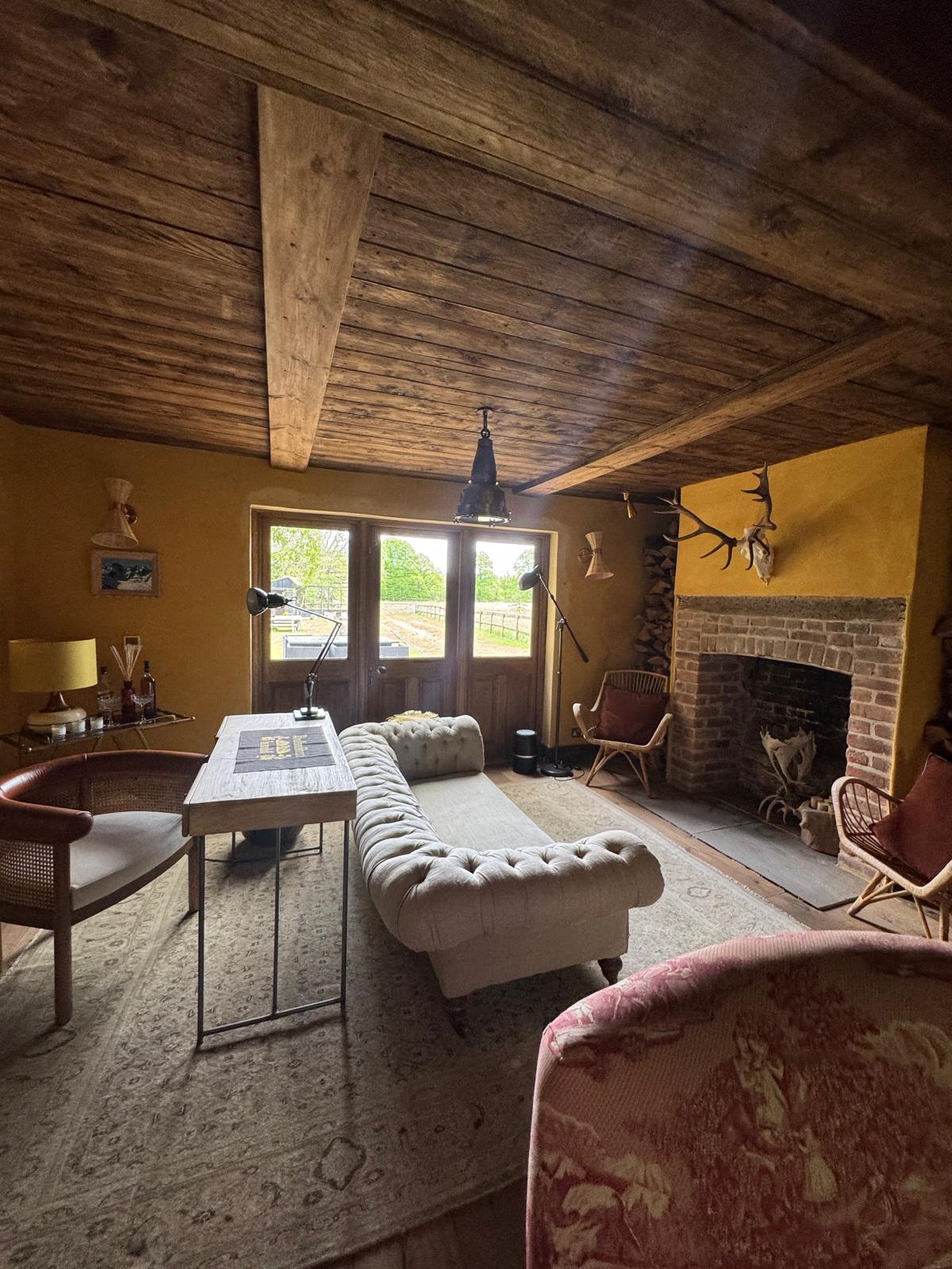 Lee Country Farm House living room with beamed ceiling